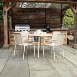 Porto 4 Seater Round Dining Set With Stacking Chairs -Gardens and Outdoors 30915709 alt01